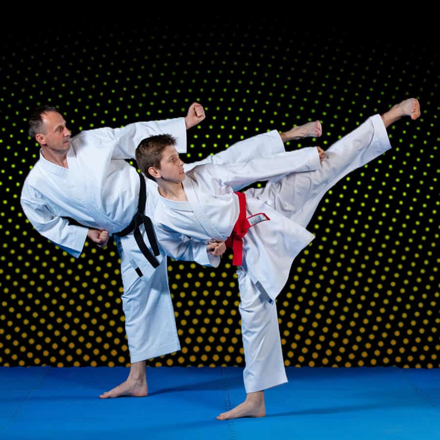 Martial Arts Lessons for Families in Pickering ON - Dad and Son High Kick